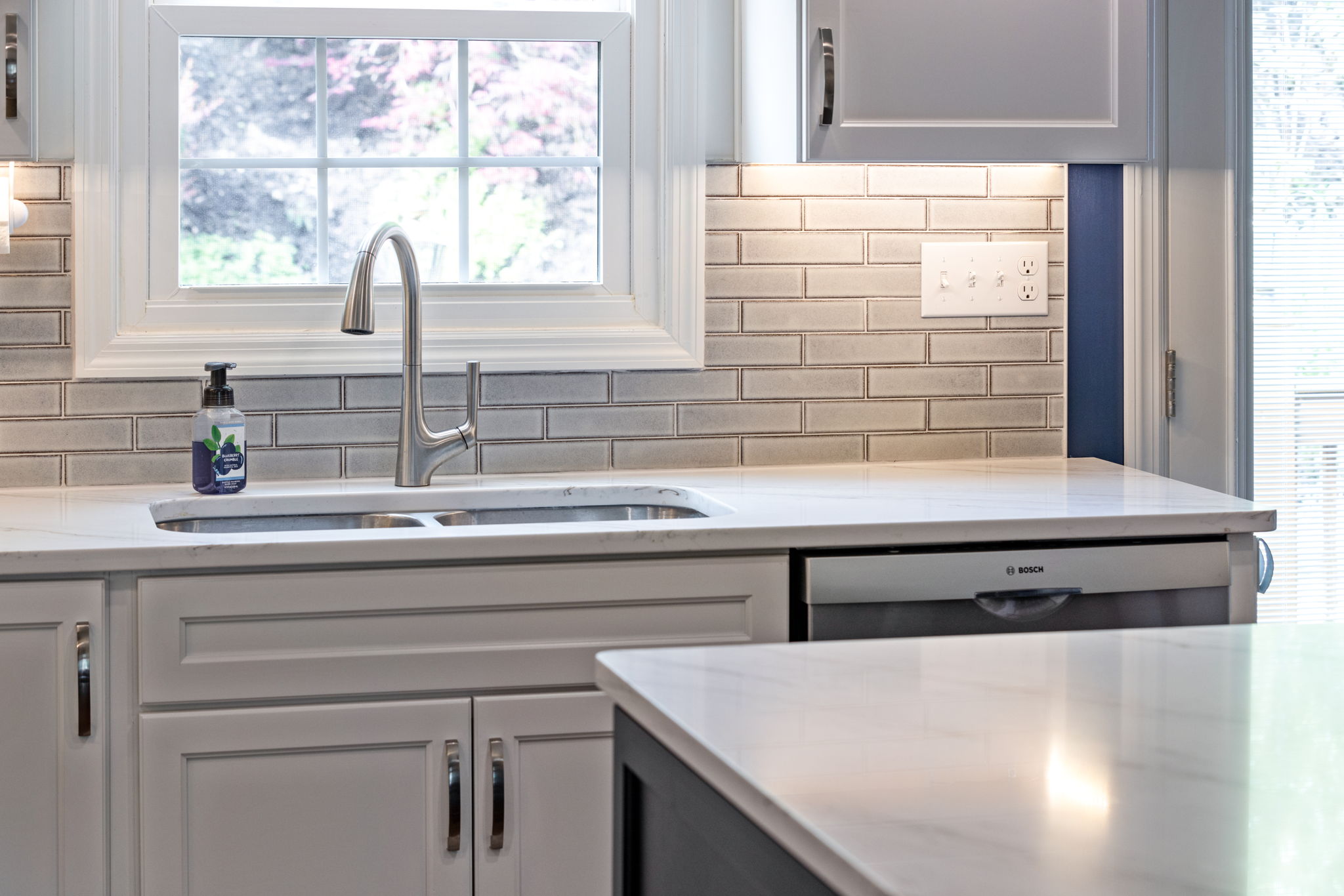 Kitchen sink and backsplash installation