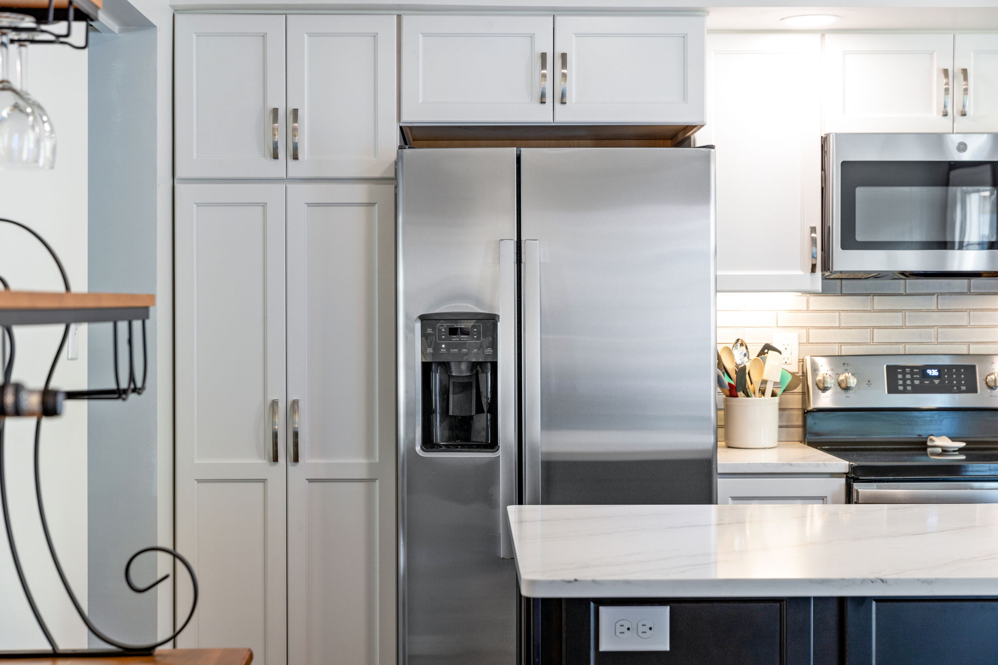 Navy accent wall with fireplace in living room