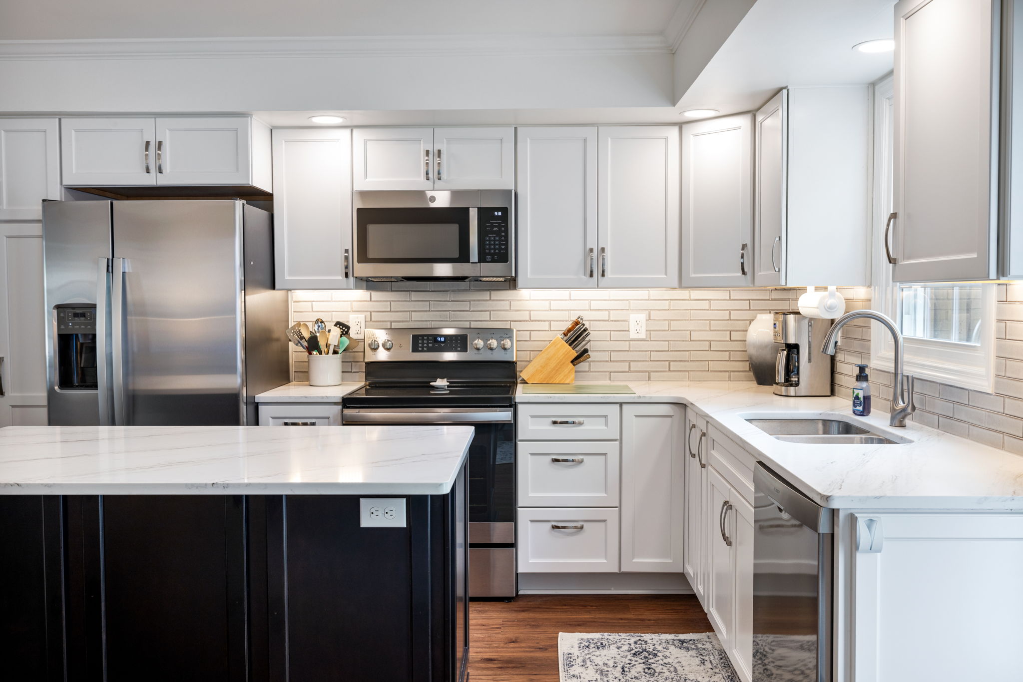 Professional kitchen remodel with subway tile backsplash