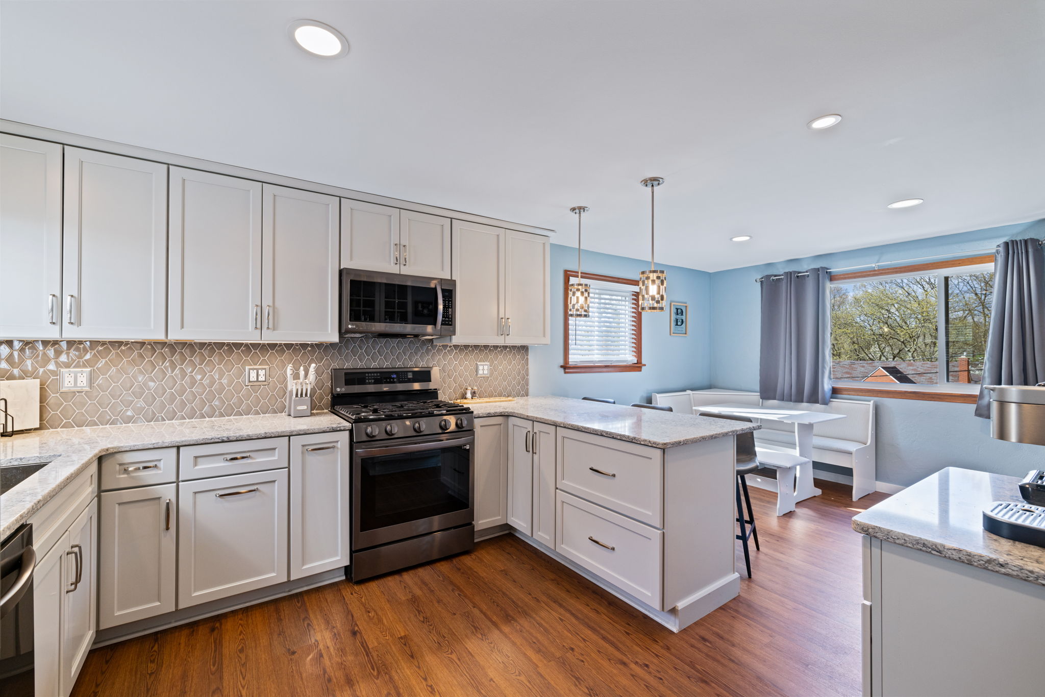 Gray cabinet with granite countertop install