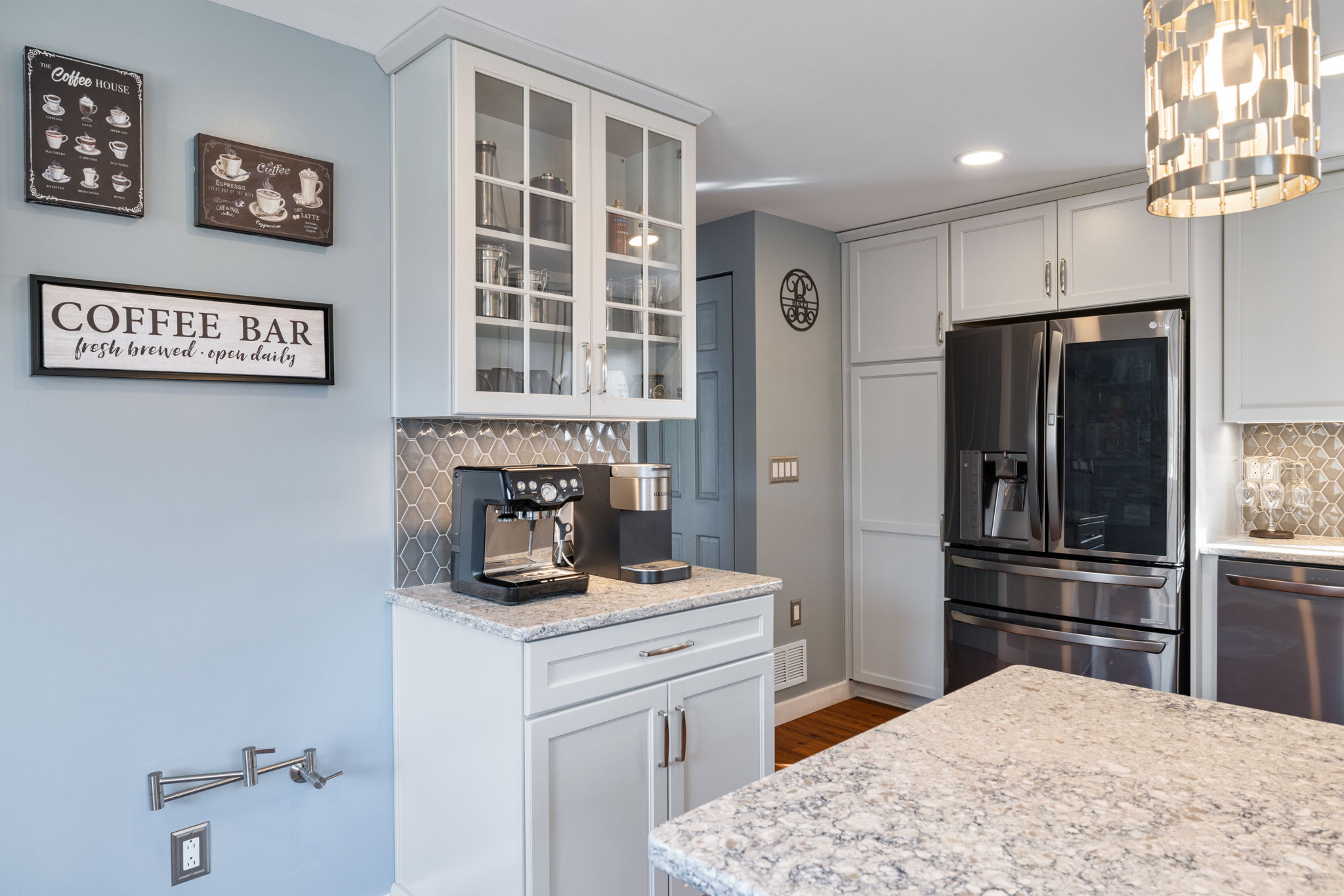 Modern gray kitchen with recessed lighting