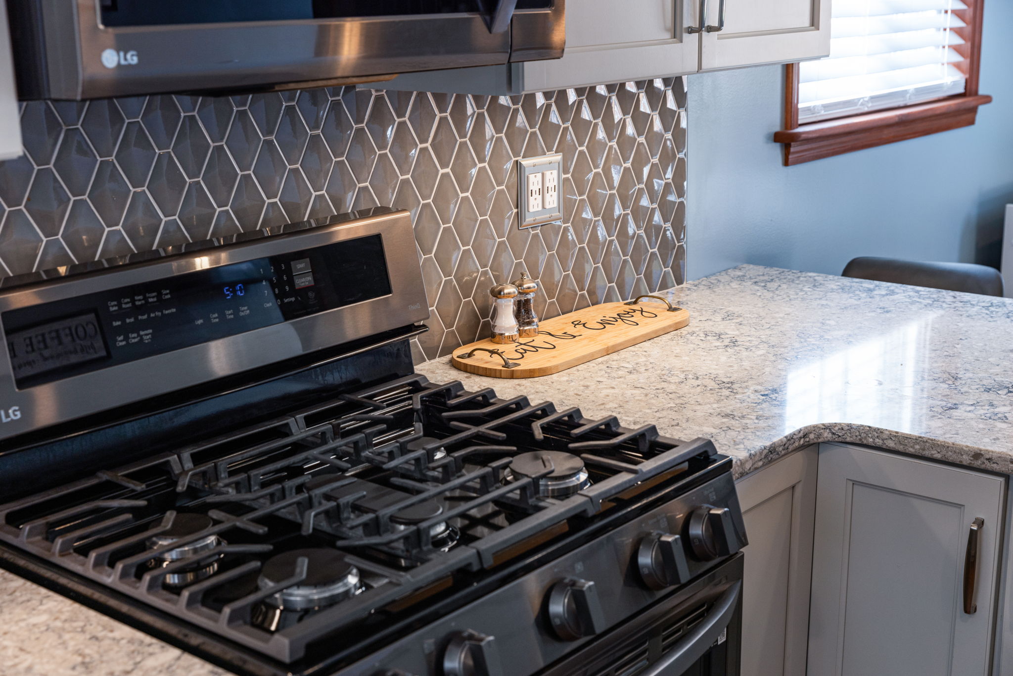 Open concept kitchen with hardwood floors