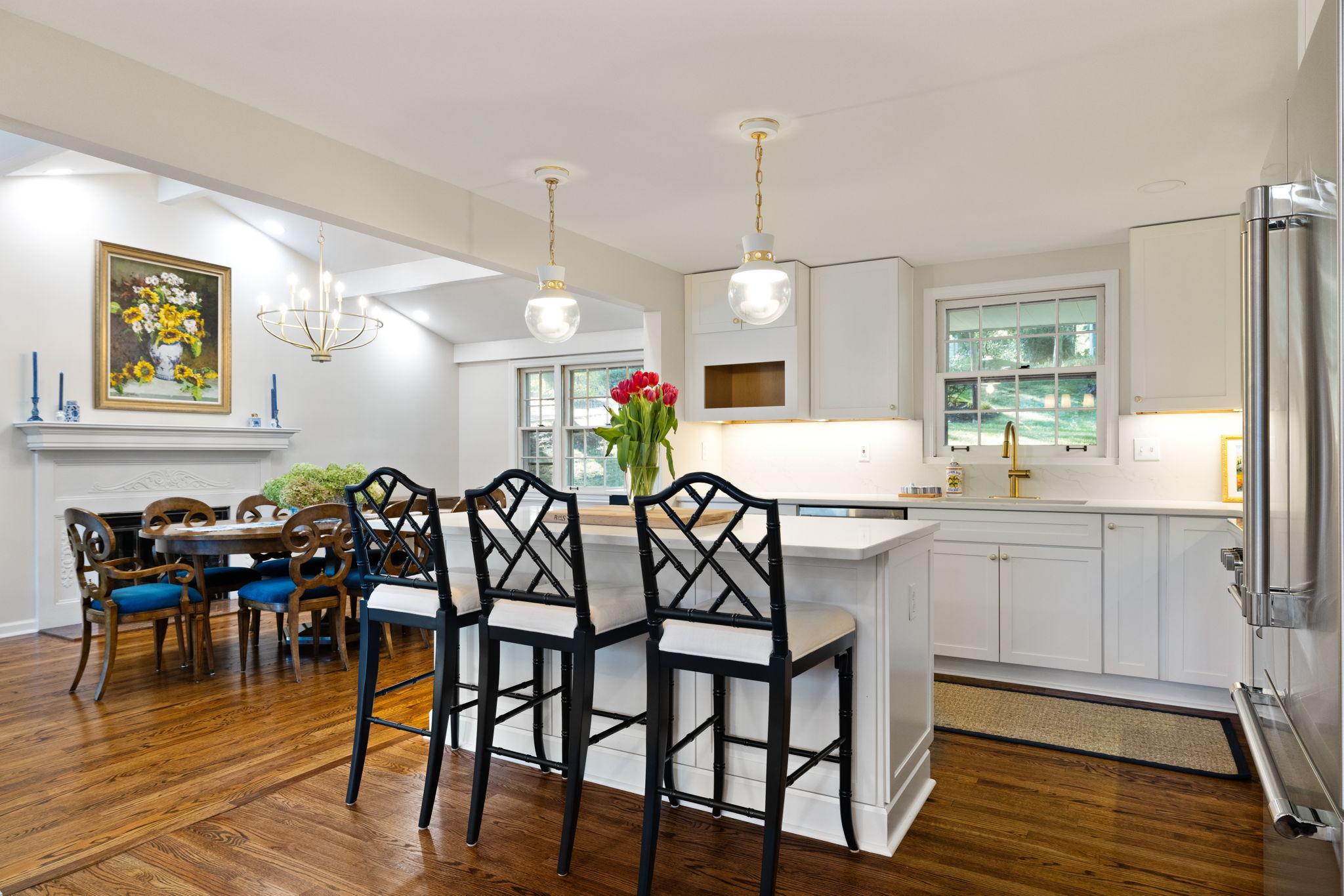 Transitional white kitchen with brass fixtures