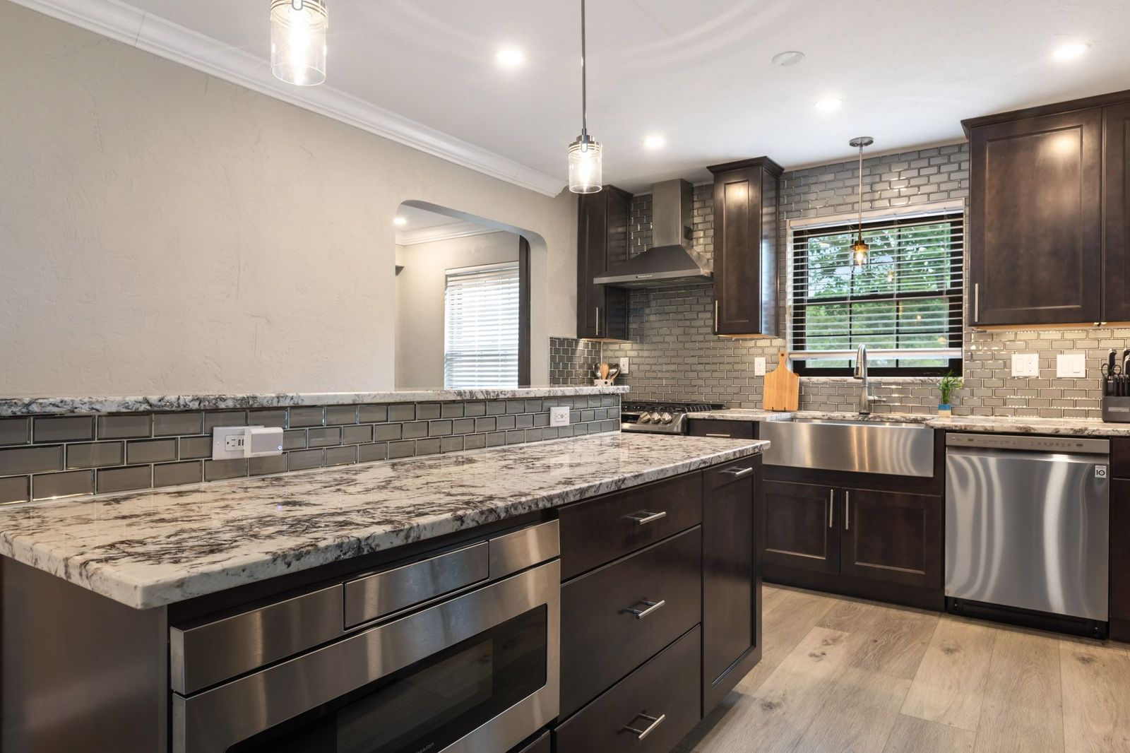 Kitchen island with seating and pendant lights