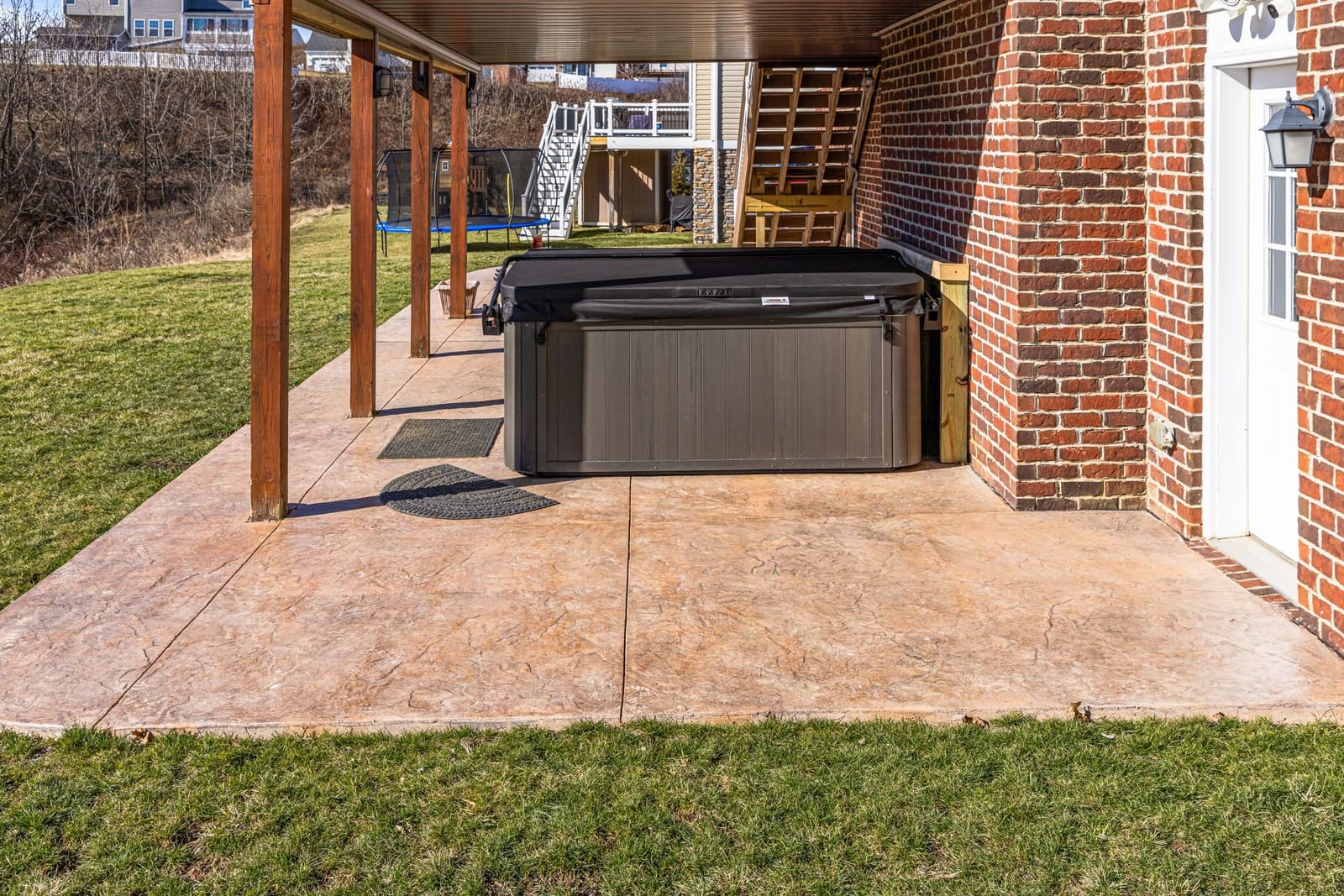 Stamped concrete patio with hot tub in Pittsburgh
