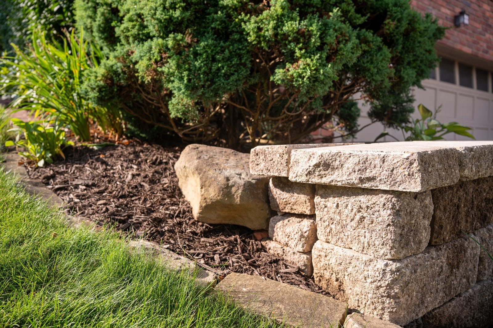 Stone retaining wall along driveway in Pittsburgh